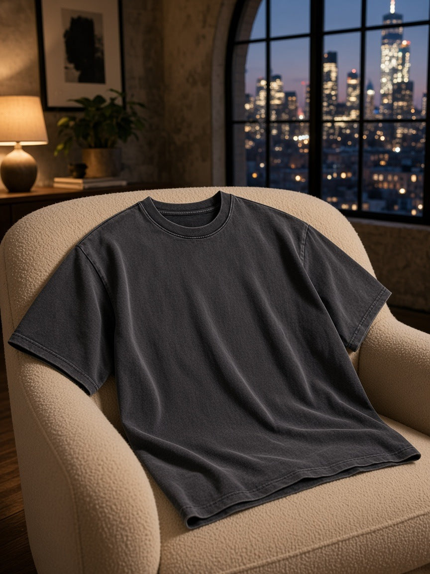 Marcel Afters Snow Washed Heavyweight Oversize T-Shirt in Black, laid flat, city