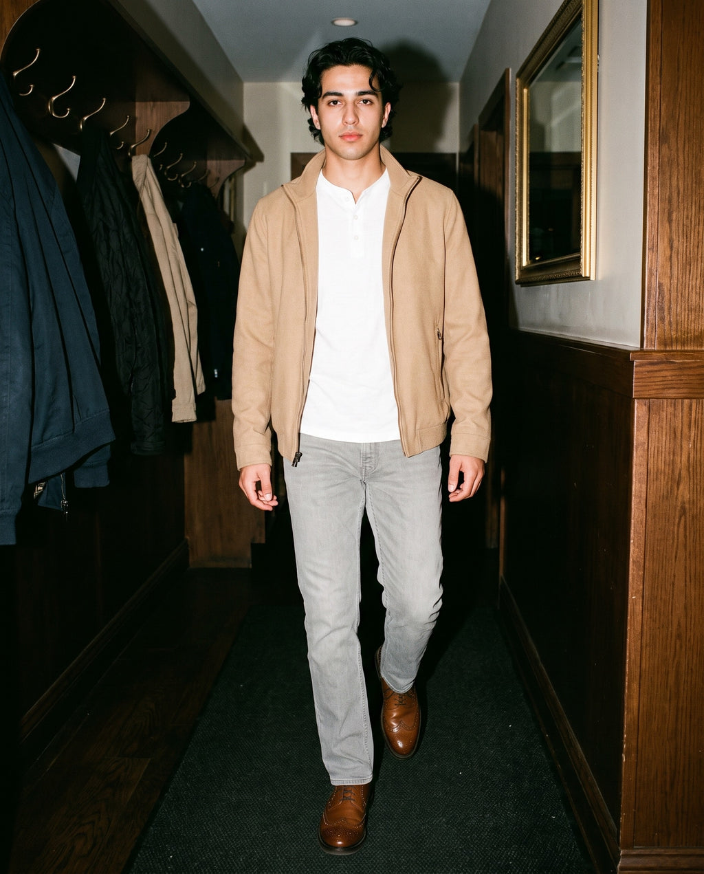 Man wearing the Marcel Afters Snow Washed Straight Leg Pants, Light Tones in Stone Gray, full-length editorial photograph