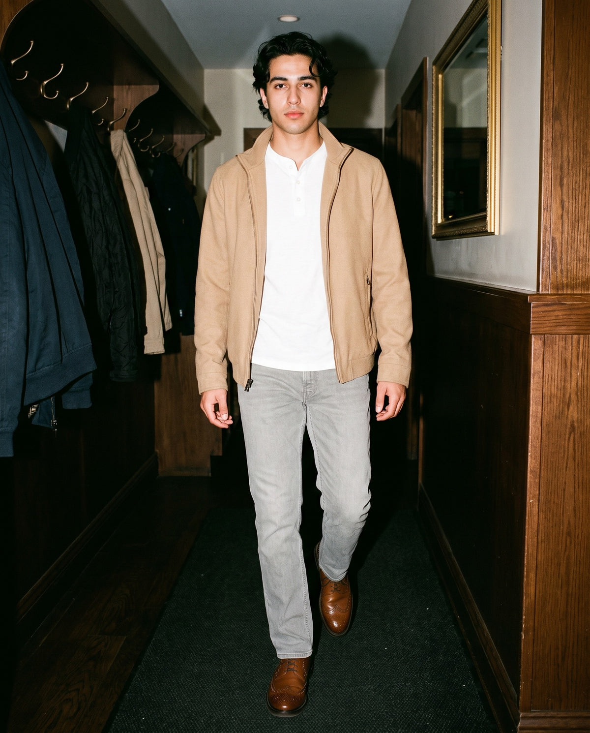 Man wearing the Marcel Afters Snow Washed Straight Leg Pants, Light Tones in Stone Gray, full-length editorial photograph