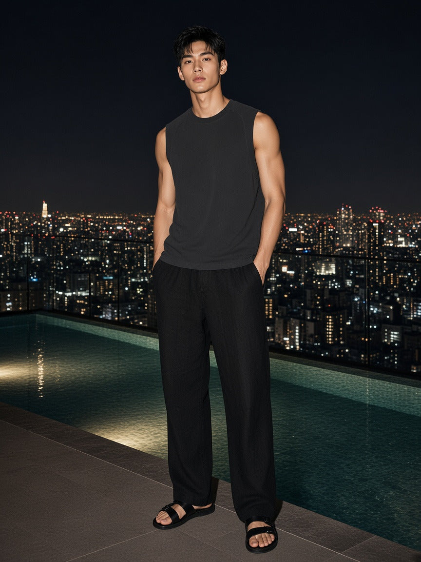 Man wearing the Sorona Quick-Dry Cooling Tank Top in Black, full-length model photo