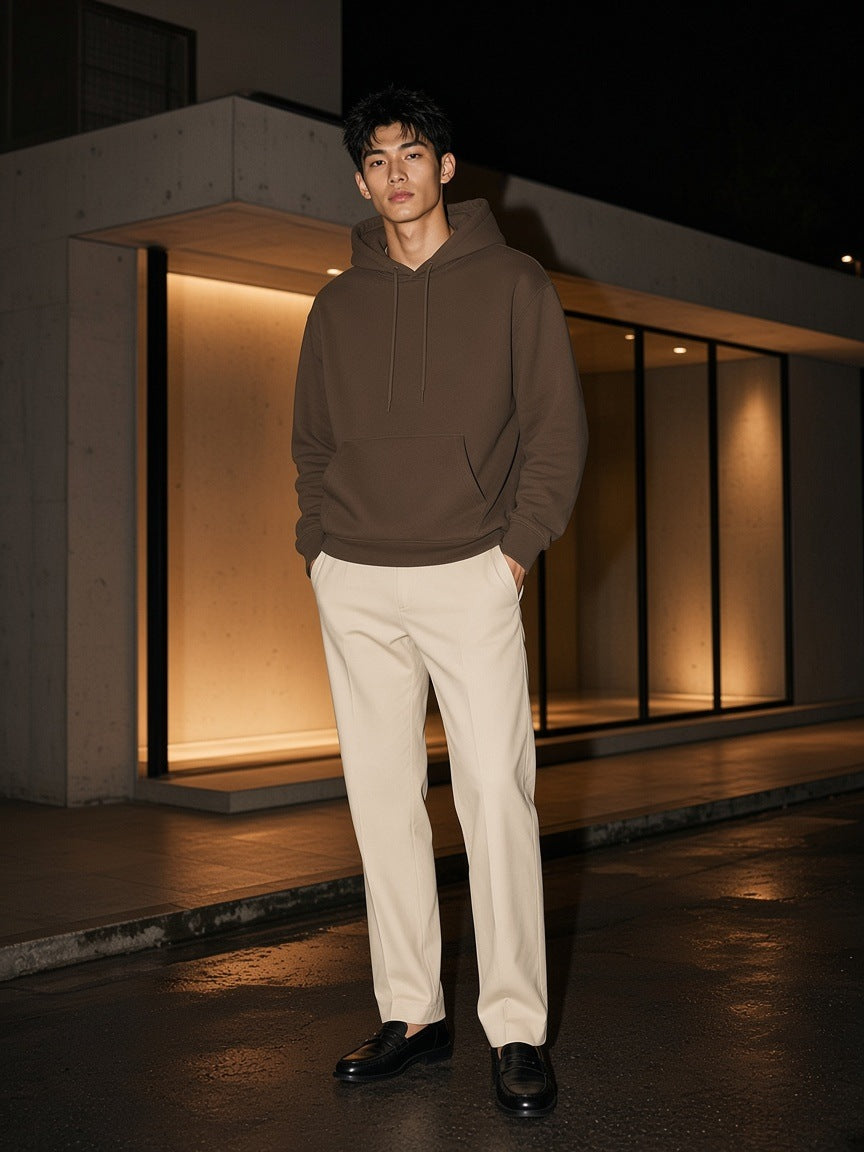 Marcel Afters Streetwear Fleece Hoodie in Brown, worn by a man, at night
