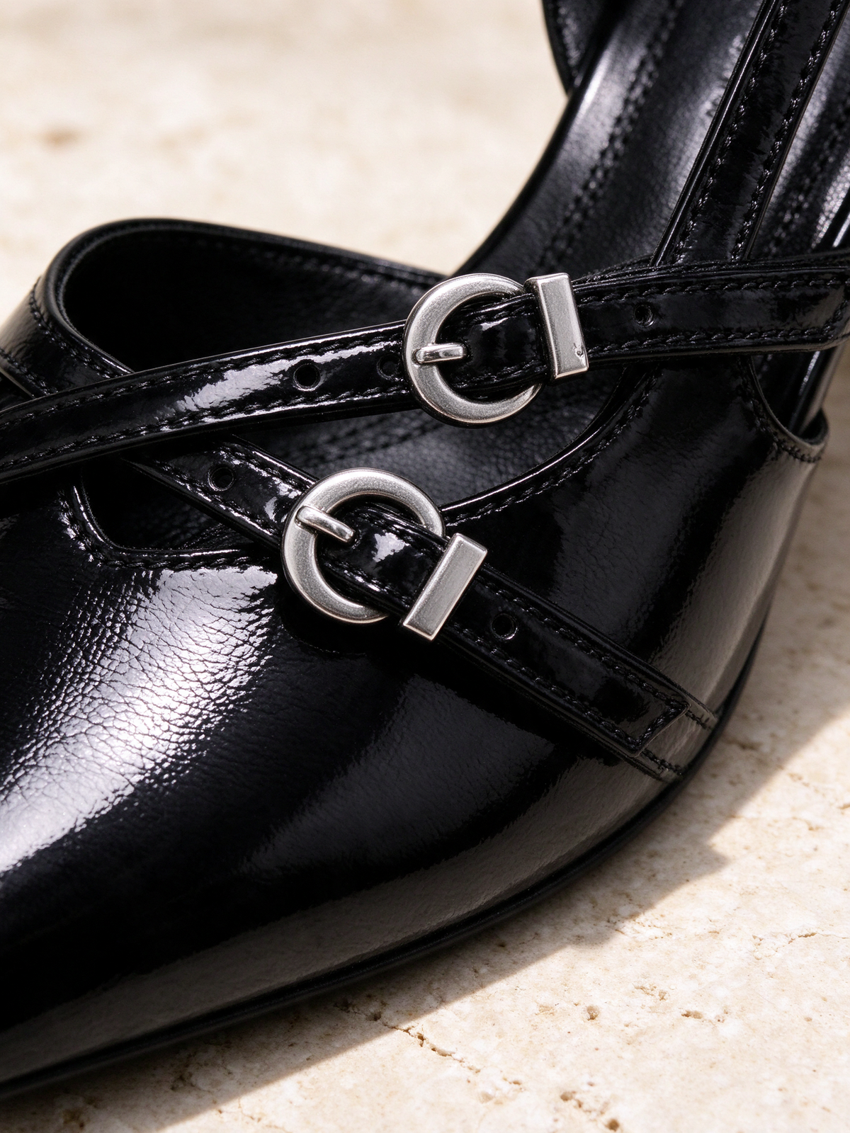 The After Six Slingback in black, detail shot: leather, stitching, sole or hardware