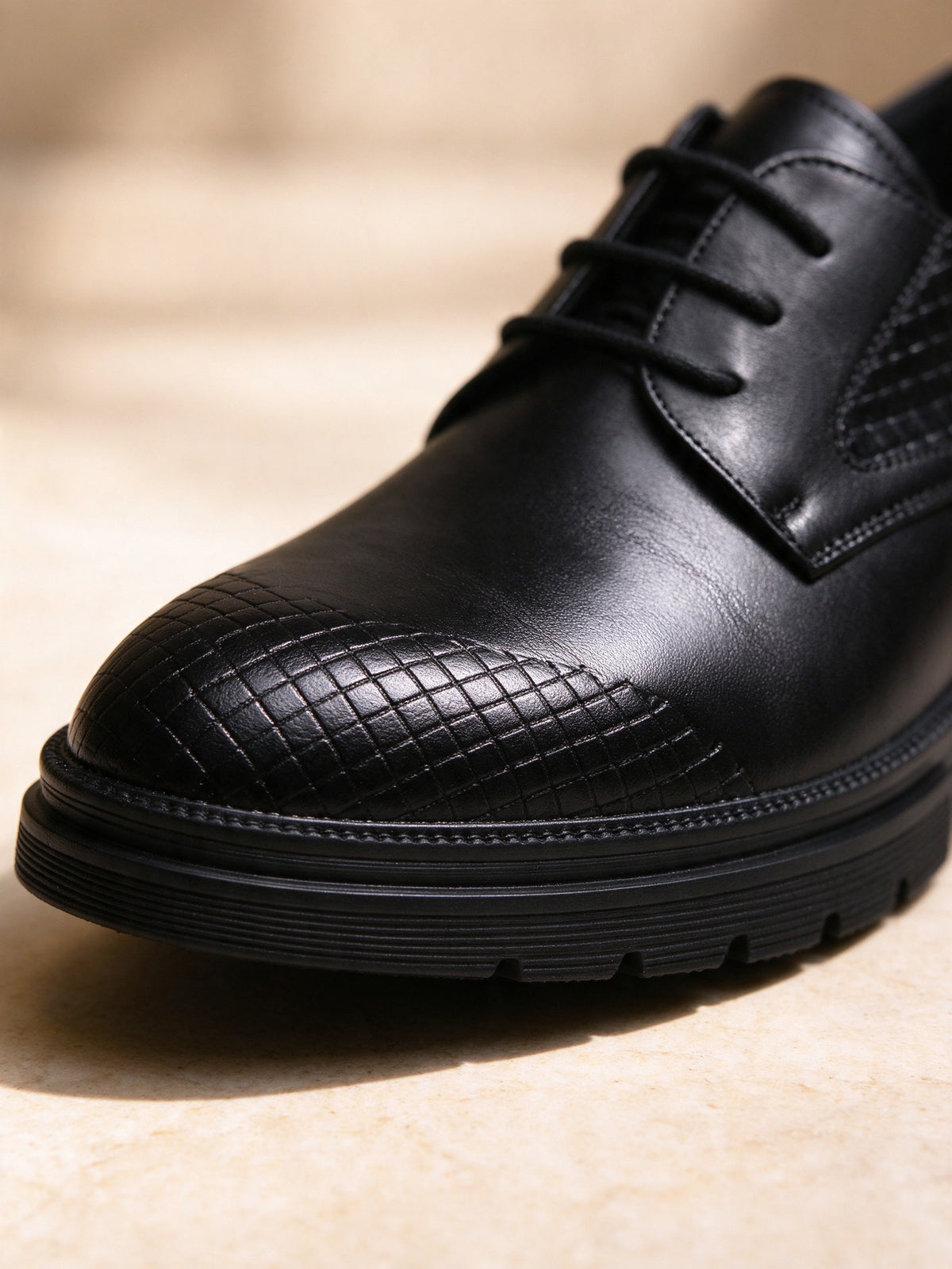 Marcel Afters The Doorman Derby in black, close-up detail of the leather, stitching and sole