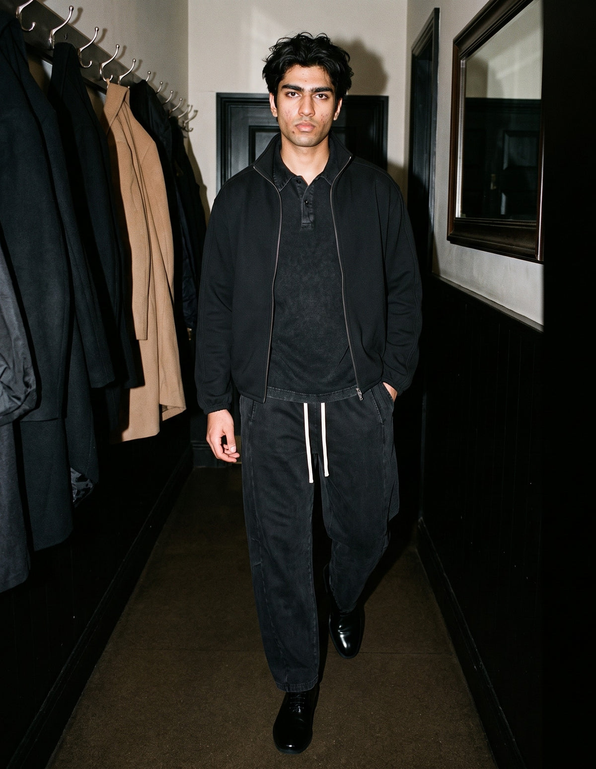 The Press Night Oxford in Black, worn by a man