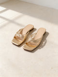 The Siesta Slide in Gold, pair on pale limestone