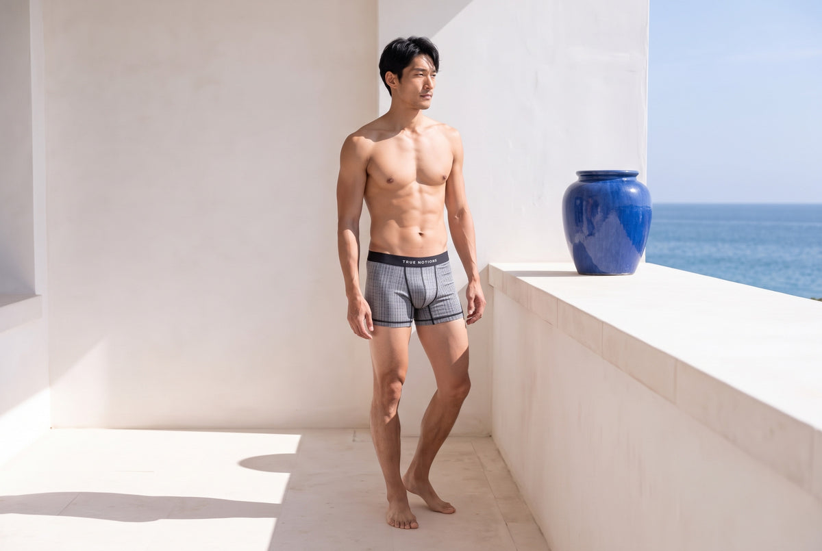 Man in True Notions Tartan Boxer Brief in Grey, front view (a style and colour in the Tartan Boxer Briefs 3-Pack — Grey)