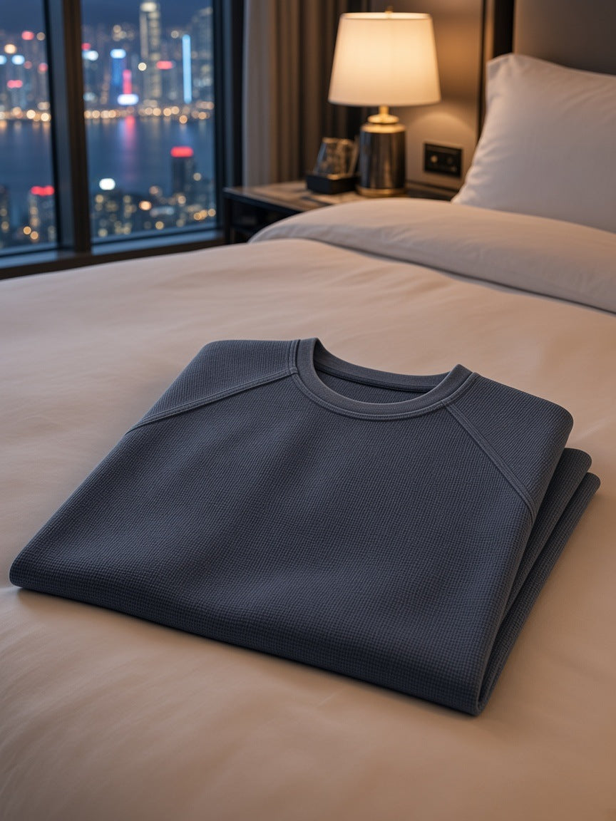 Marcel Afters Mineral Wash Boxy Waffle T-Shirt in Gray, laid flat, hotel room