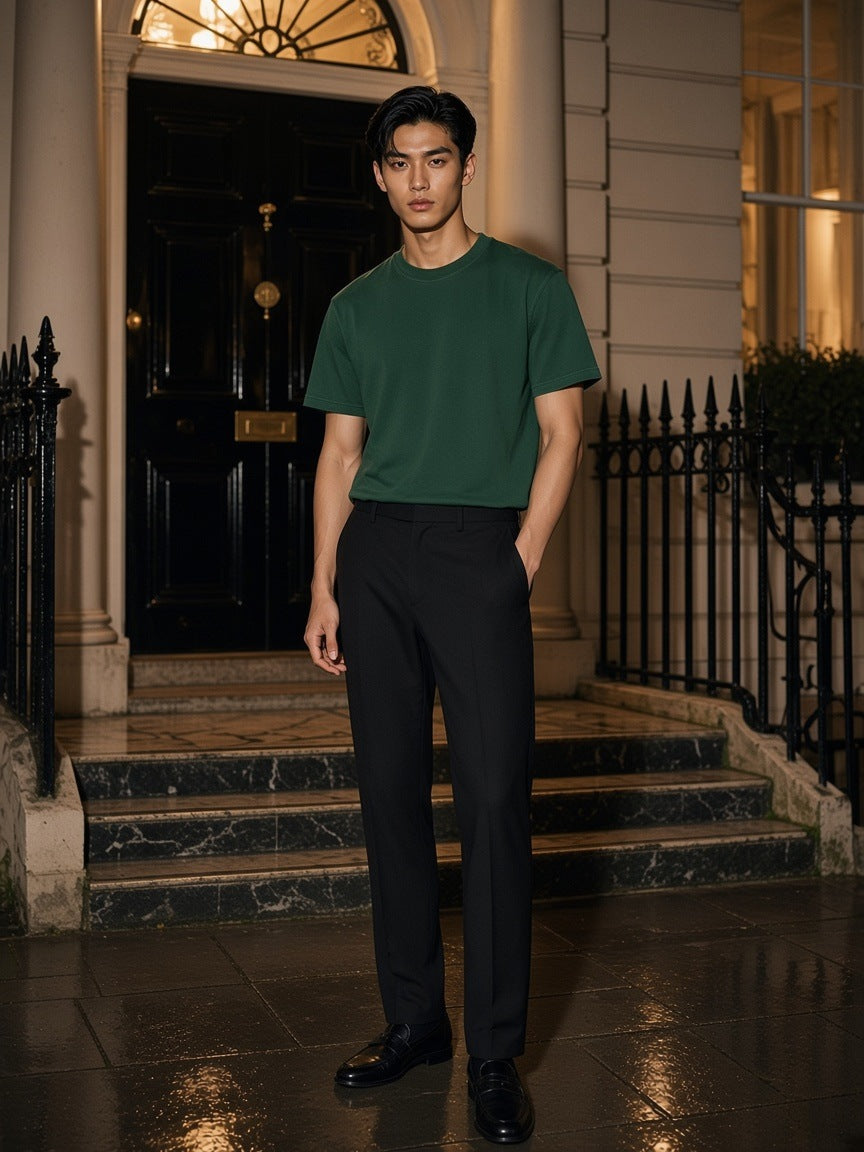 Marcel Afters Vintage Wash Distressed T-Shirt in Green, worn by a man, outside