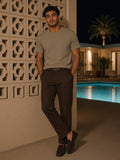 Marcel Afters Vintage Wash Sunfade Boxy Waffle T-Shirt in Light Coffee, worn by a man, poolside