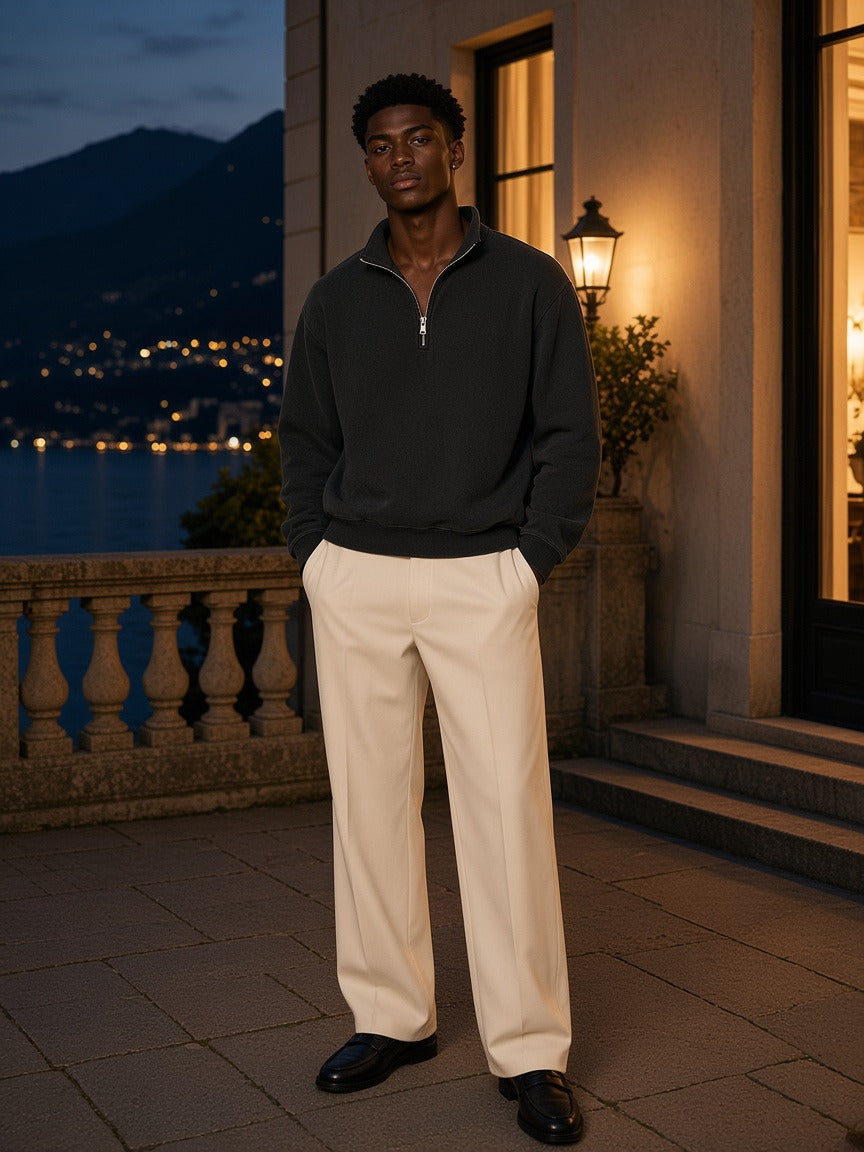 Model wearing the Vintage Wash Fleece Quarter Zip Sweatshirt in Black, full-length model photo