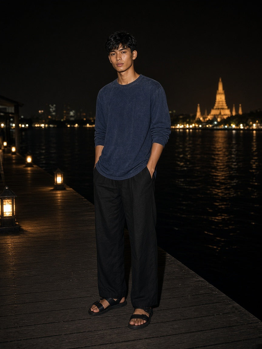 Marcel Afters Vintage Wash Layered T-Shirt in Navy Blue, worn by a man, on a dock at night
