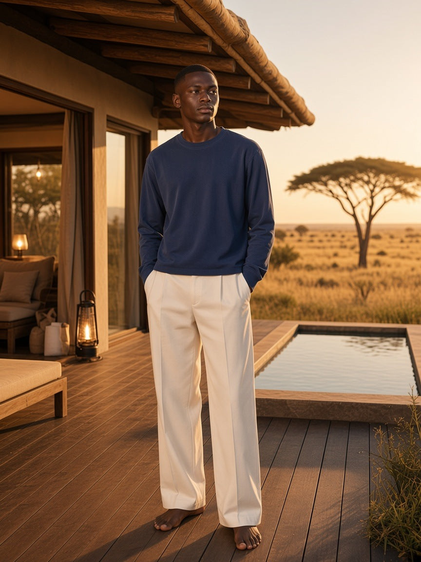 Marcel Afters Vintage Wash Long Sleeve Boxy T-Shirt in Navy Blue, worn by a man, safari