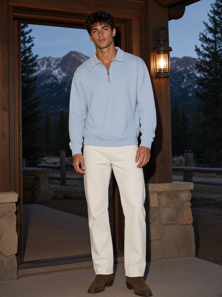 Model wearing the Vintage Wash Quarter-Zip Sweatshirt in Light Blue, full-length model photo