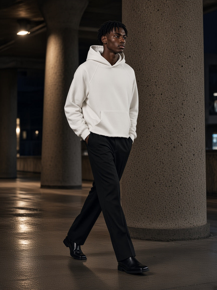 Model wearing the Vintage Wash Raw Edge Boxy Hoodie in White, full-length model photo