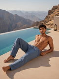 Model wearing the Vintage Washed Barrel Leg Sweatpants in Gray Blue, full-length model photo