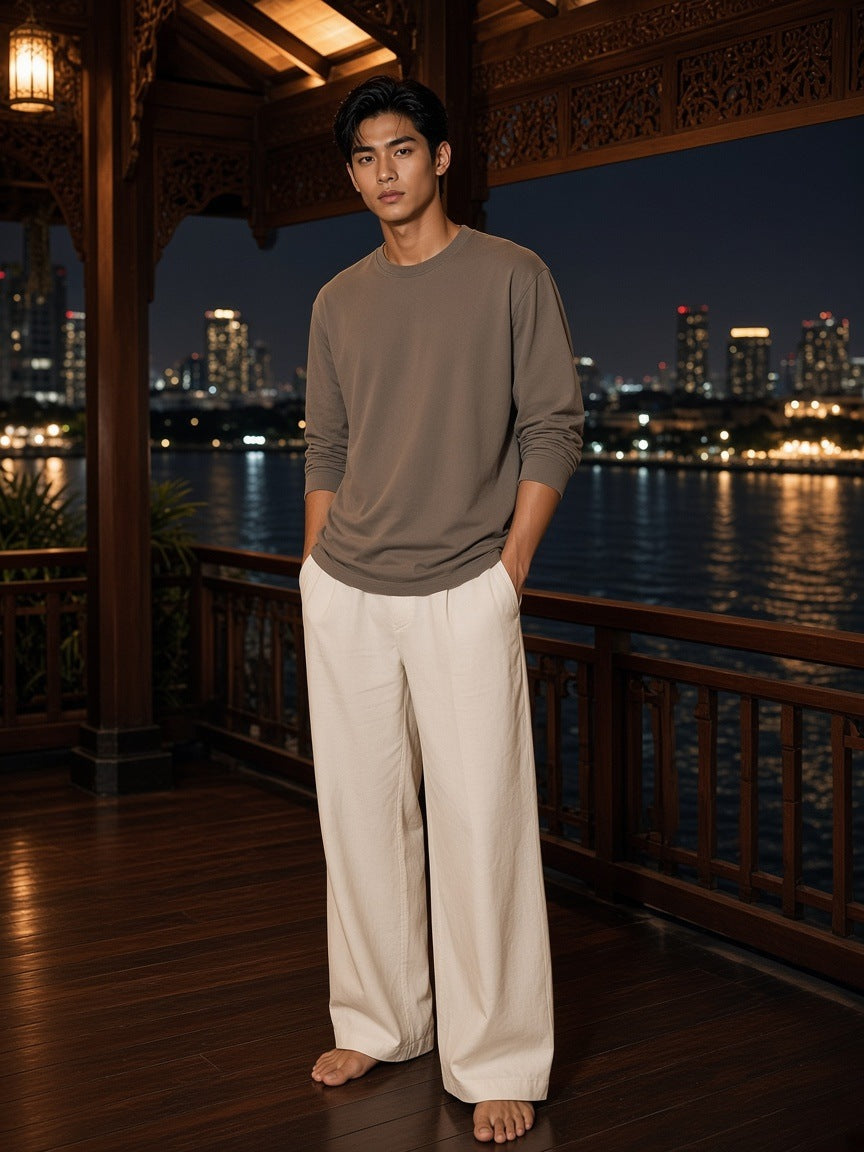 Marcel Afters Vintage Washed Long Sleeve T-Shirt in Brown, worn by a man, night city