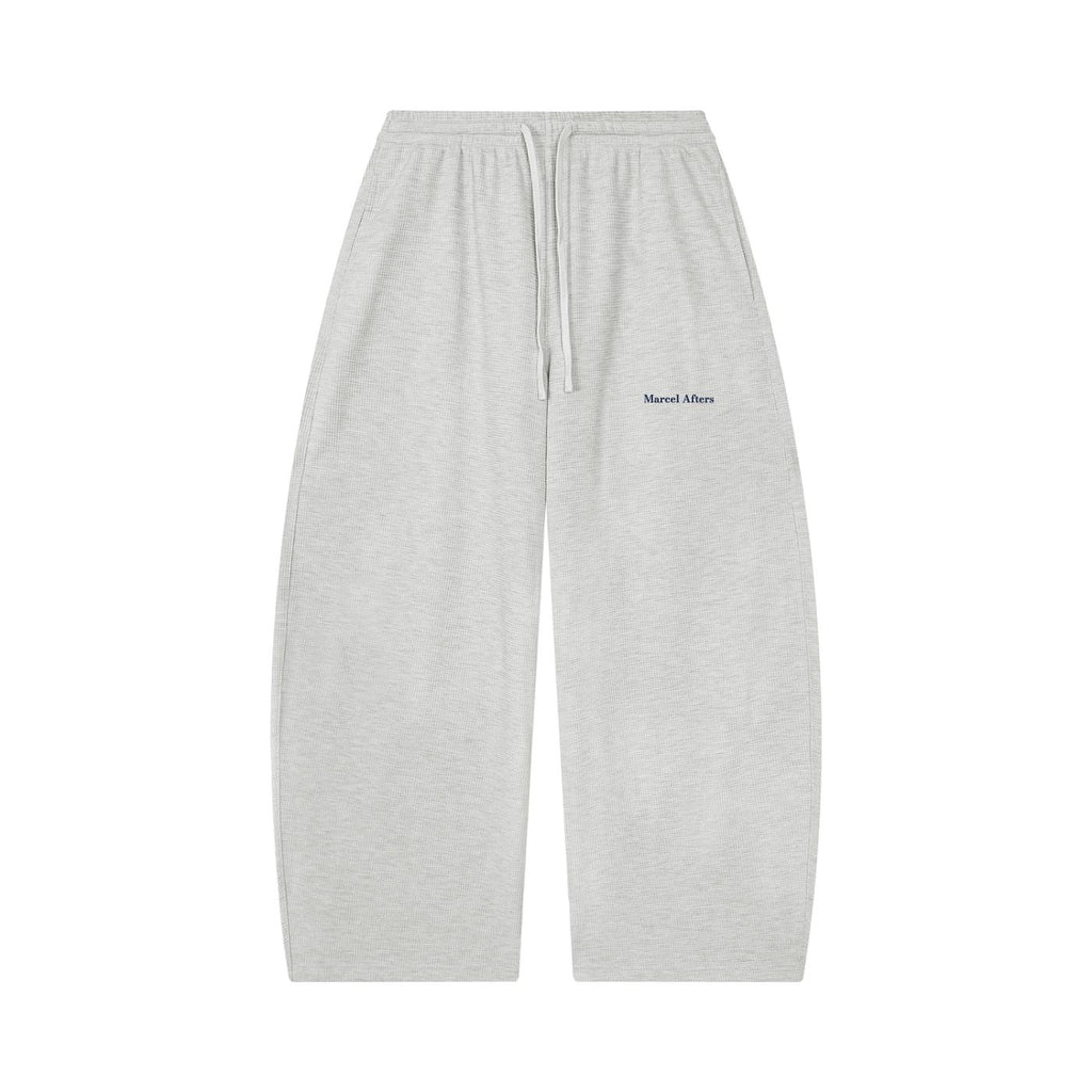 Marcel Afters Waffle Barrel Leg Pants in Oat Gray, laid flat
