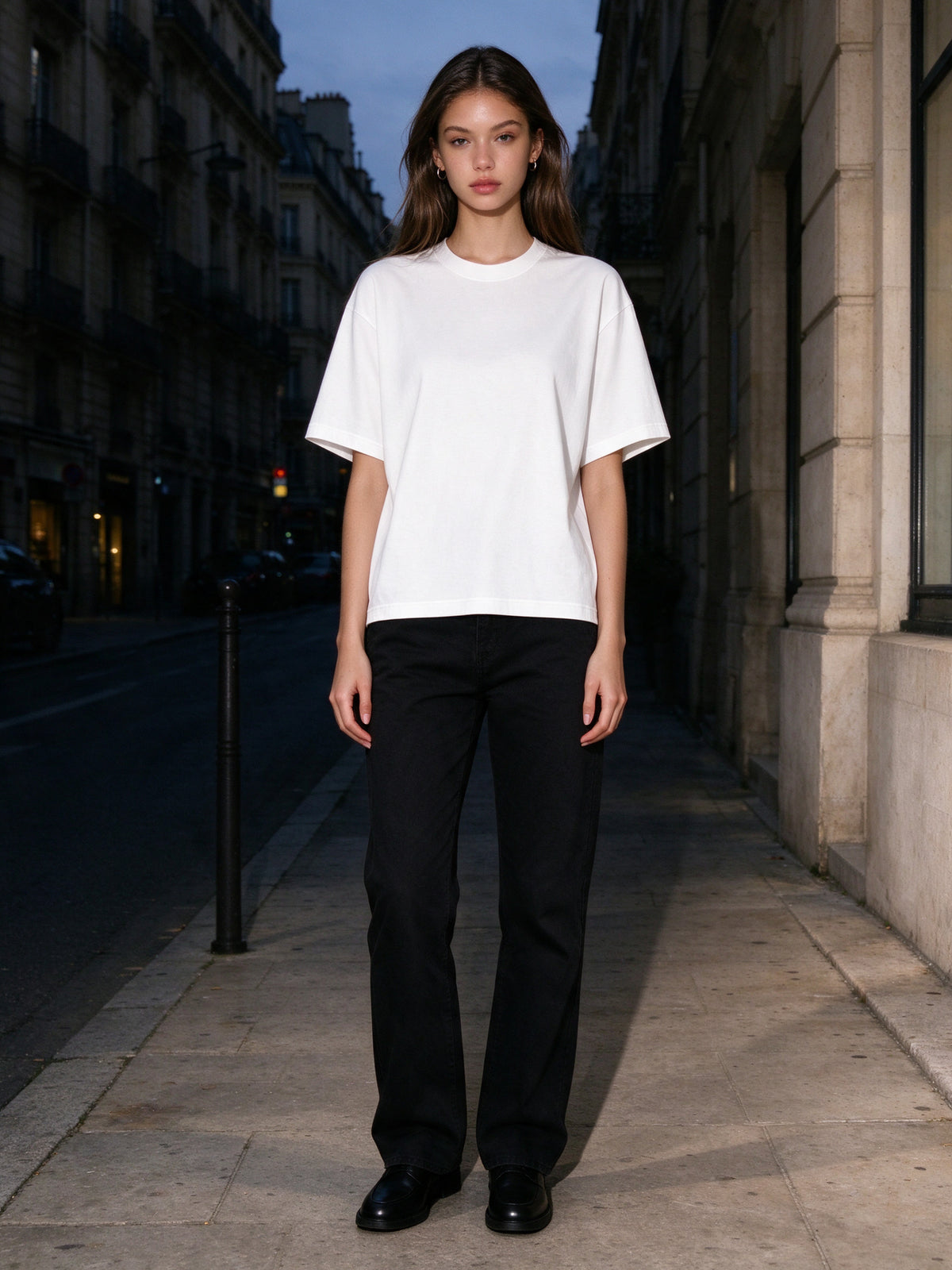 Woman wearing the Women's Boxy Oversized T-Shirt in White, full-length model photo