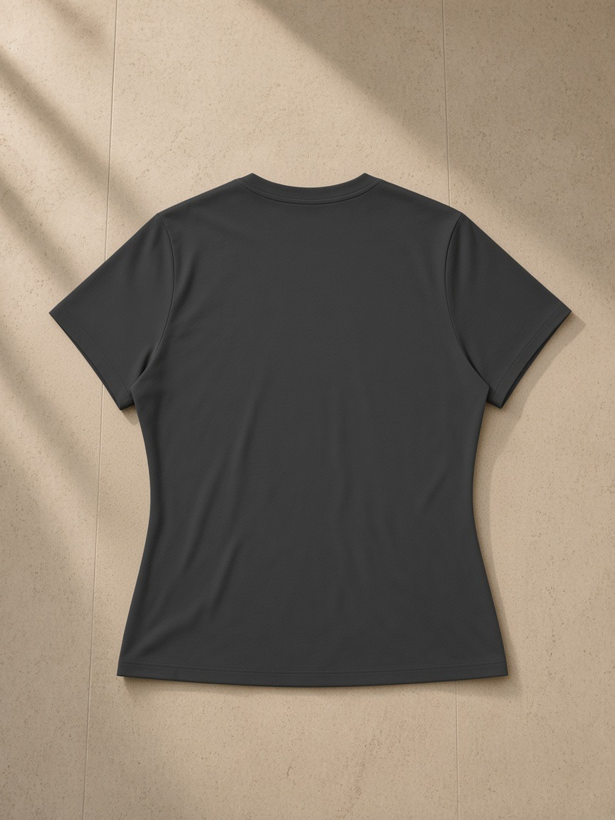 Women’s Slim Fit Performance T-Shirt in Dark Gray, laid flat on pale limestone, back view