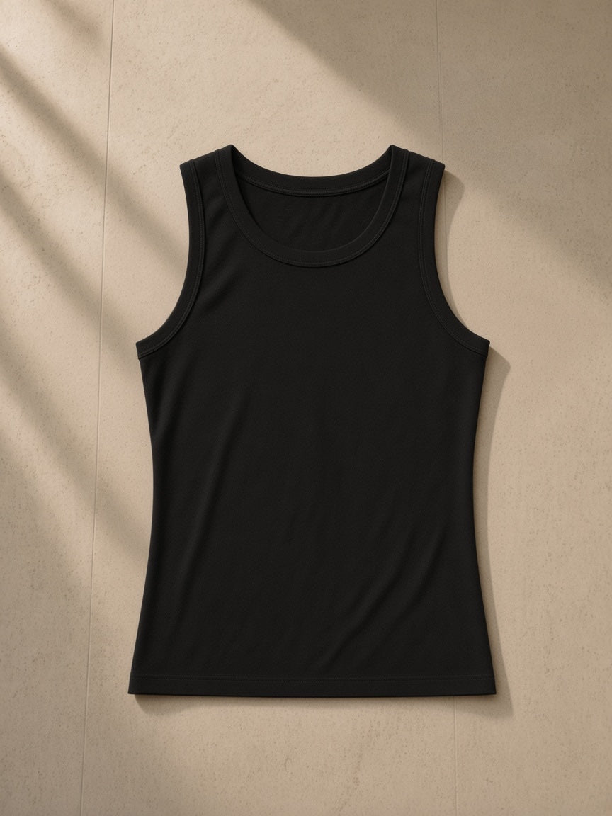 Women's Slim Tank Top in Black, laid flat on pale limestone, front view