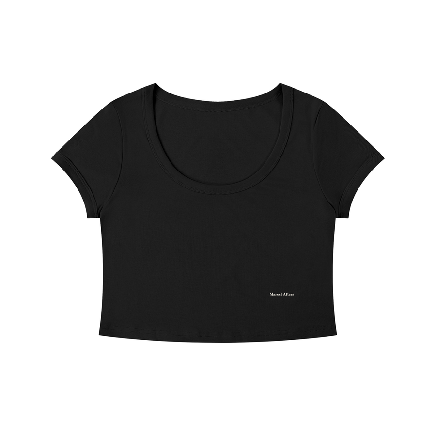 Women's Solid Color Slim Crop T-Shirt in Black, front view, small Marcel Afters wordmark at the lower left front.