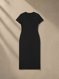 Women's V-Neck Short Sleeve Maxi Dress in Black, laid flat on pale limestone
