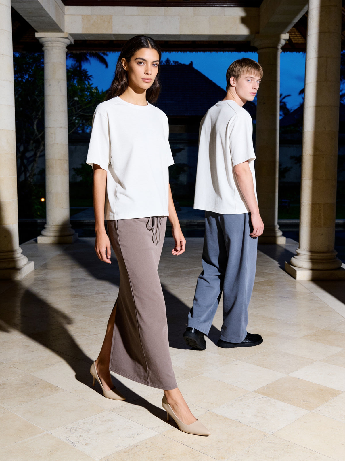 The Back Stairs Lace-Up worn on model in a travertine atrium with a pale stone floor, Bali
