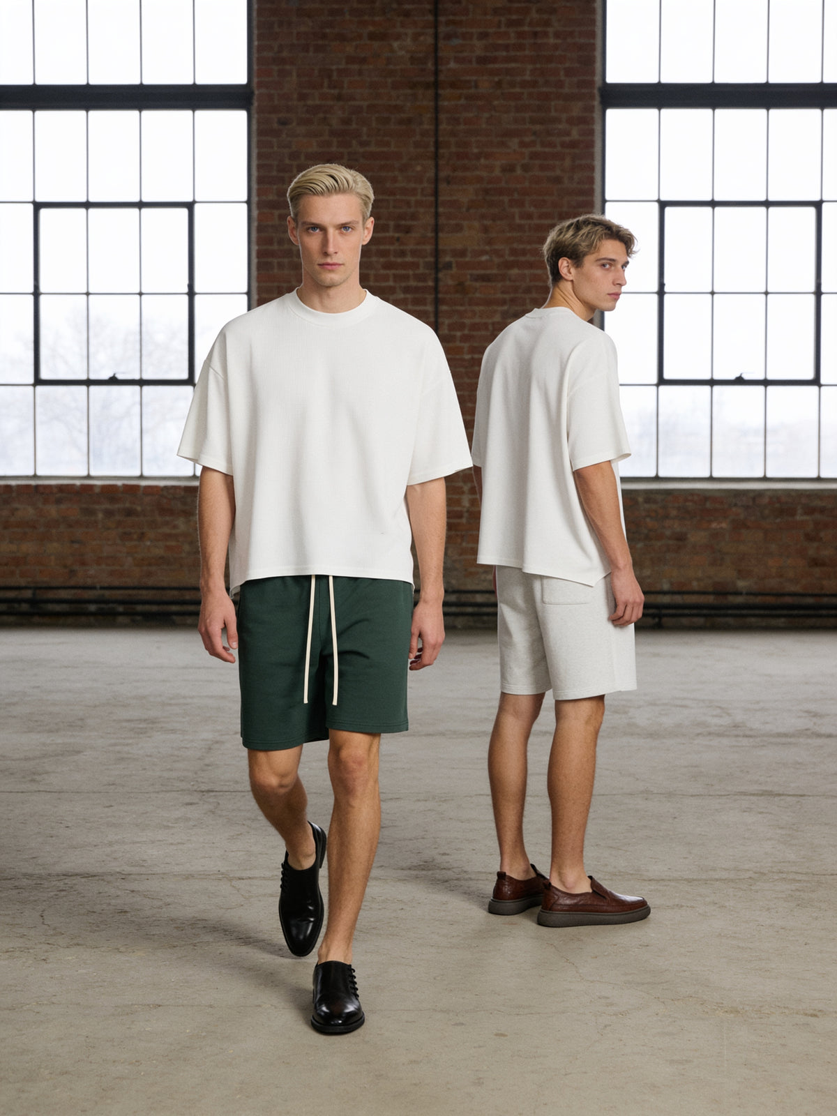The Day Pass Slip-On worn on model in a brick loft with a double-height window wall, Bucharest