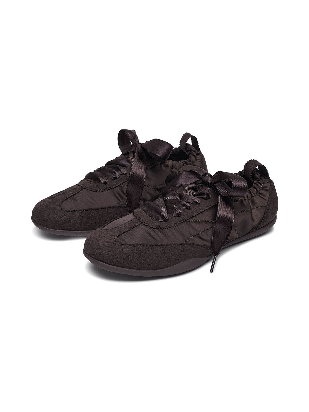 The Rehearsal Sneaker in Espresso, on a white studio background