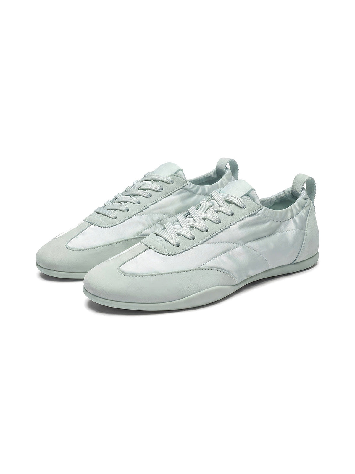 The Rehearsal Sneaker in Pale Sage, on a white studio background