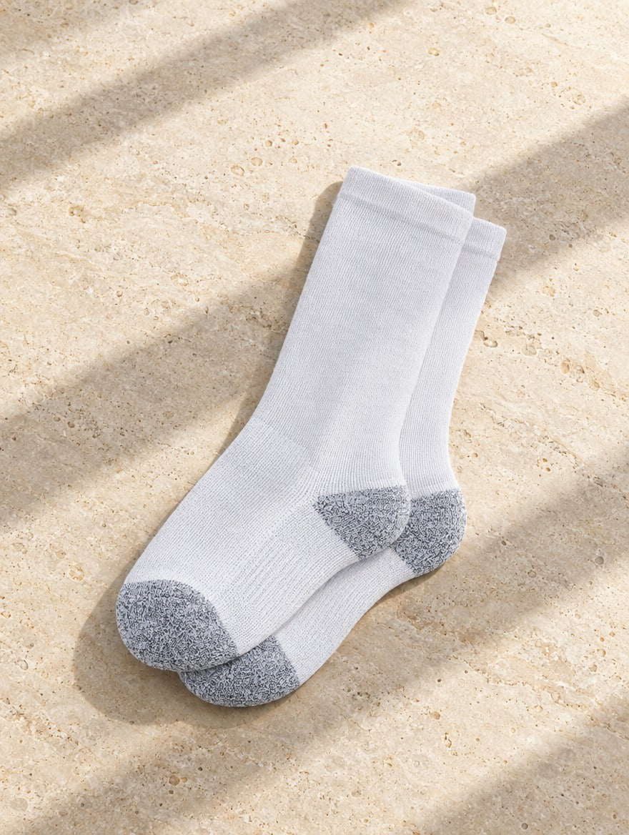 Performance Crew Socks in White — flat lay