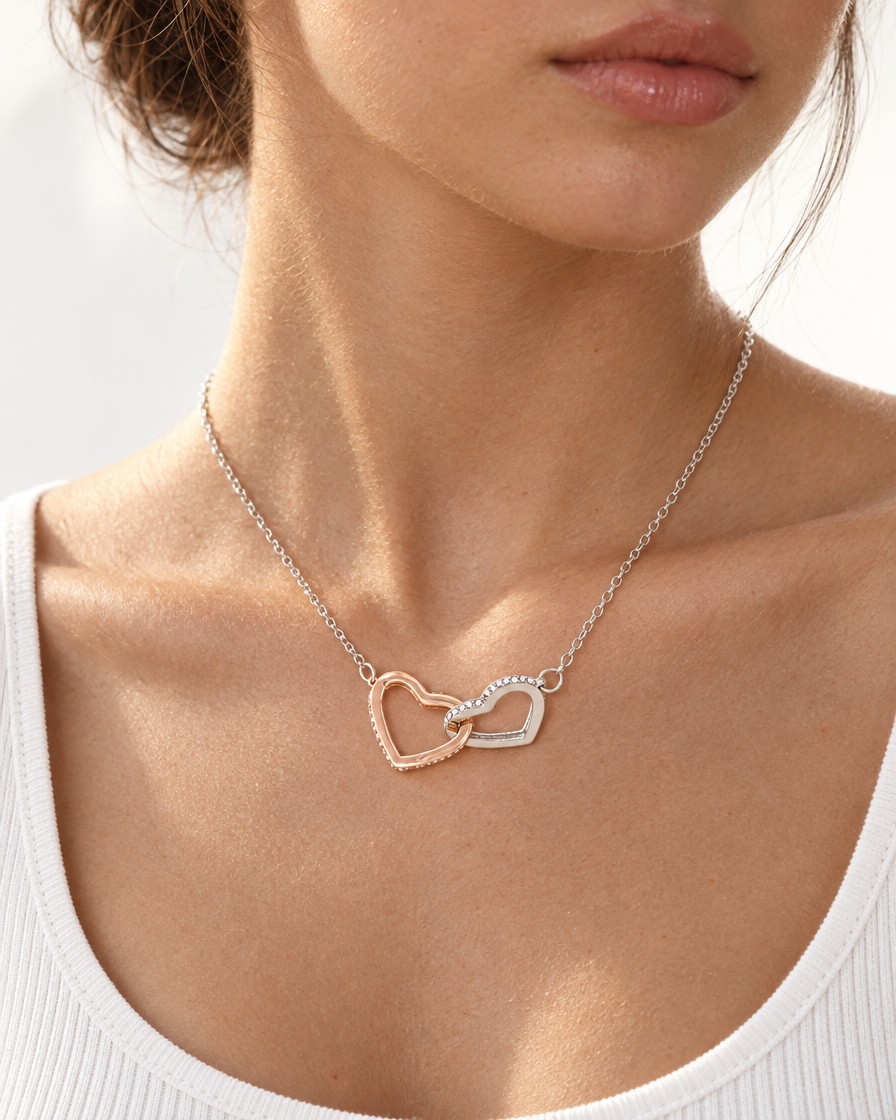Interlocking Hearts Pendant Necklace — on neck