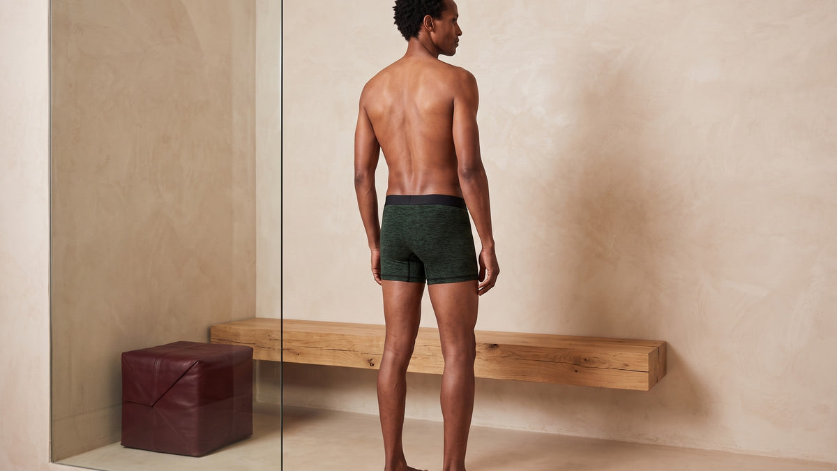 True Notions Boxer Brief - Olive / Black, worn by the model (rq view)