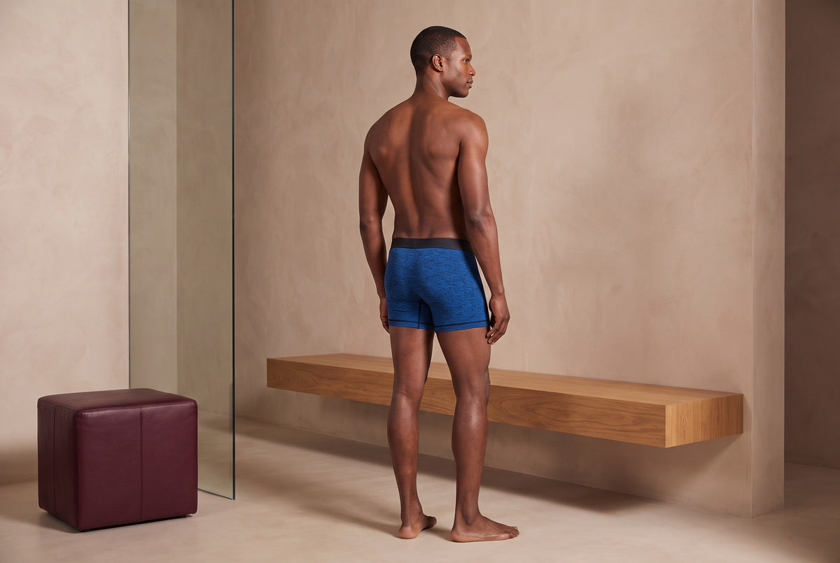 True Notions Boxer Brief - Sapphire / Black, worn by the model (front view)