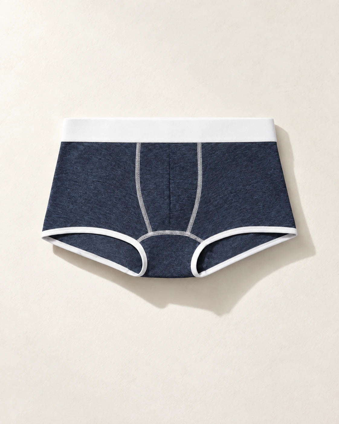 True Notions Trunk - Navy / White, laid flat on limestone