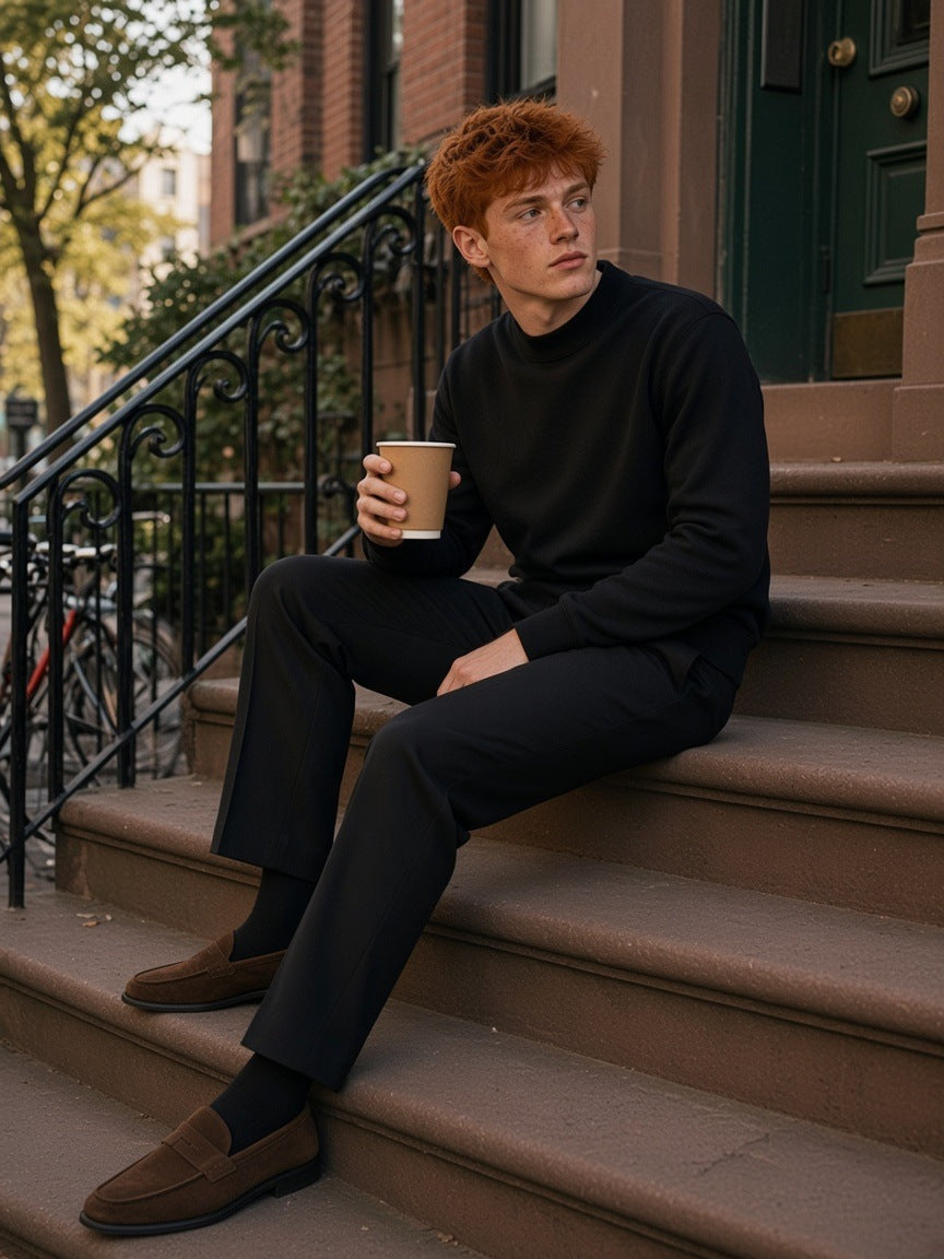 Man in the Mock Neck Sweatshirt in Black, with a coffee on a West Village stoop in New York in the morning