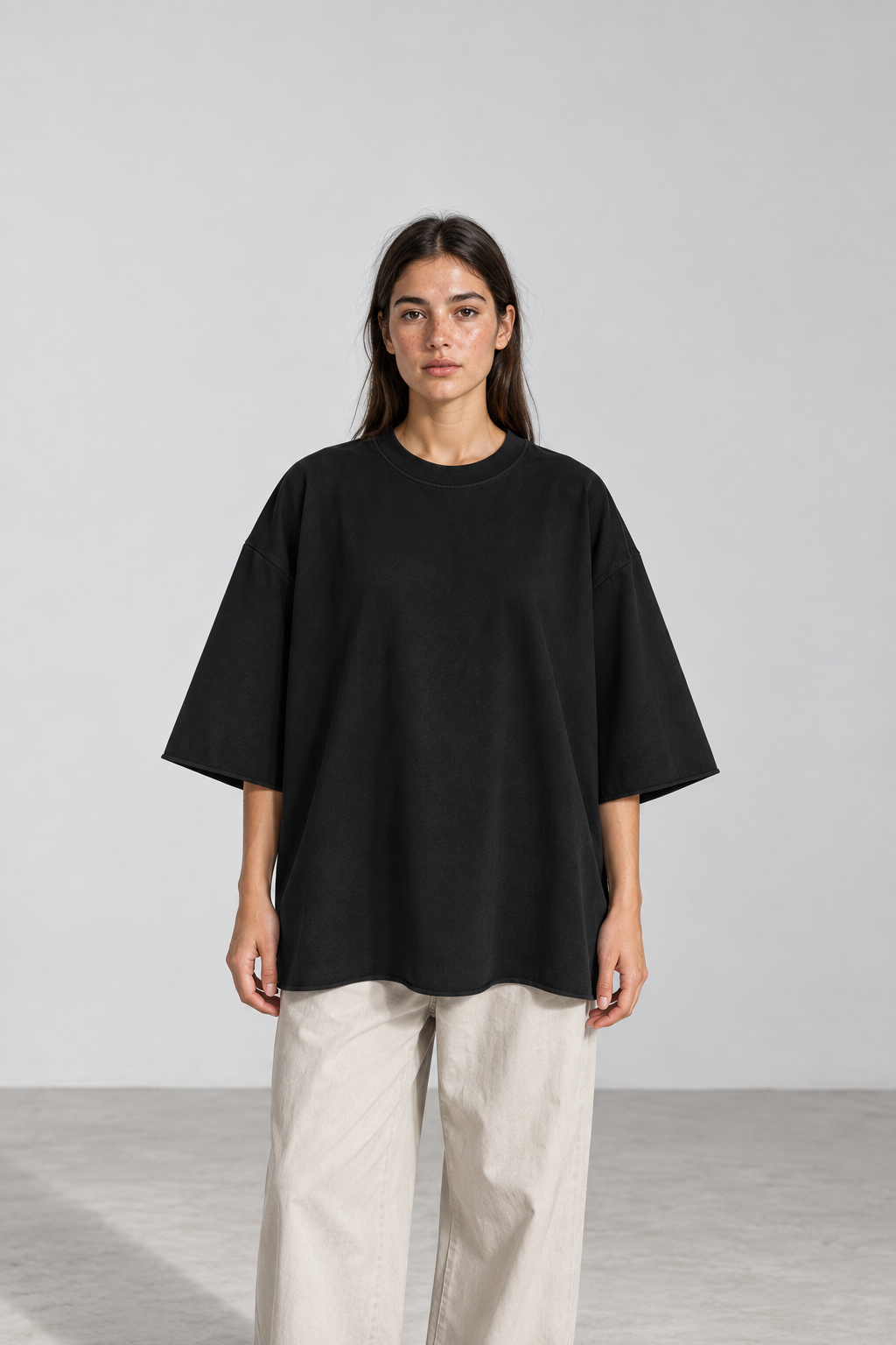 Mineral Wash Raw Hem Boxy T-Shirt in Black, women model front view