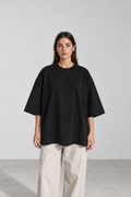Mineral Wash Raw Hem Boxy T-Shirt in Black, women model front view