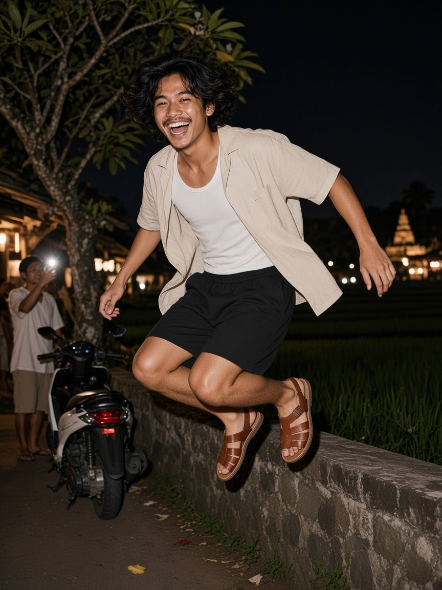 Man in the Regular Fit Shorts in Black, at a villa pool by day in Bali