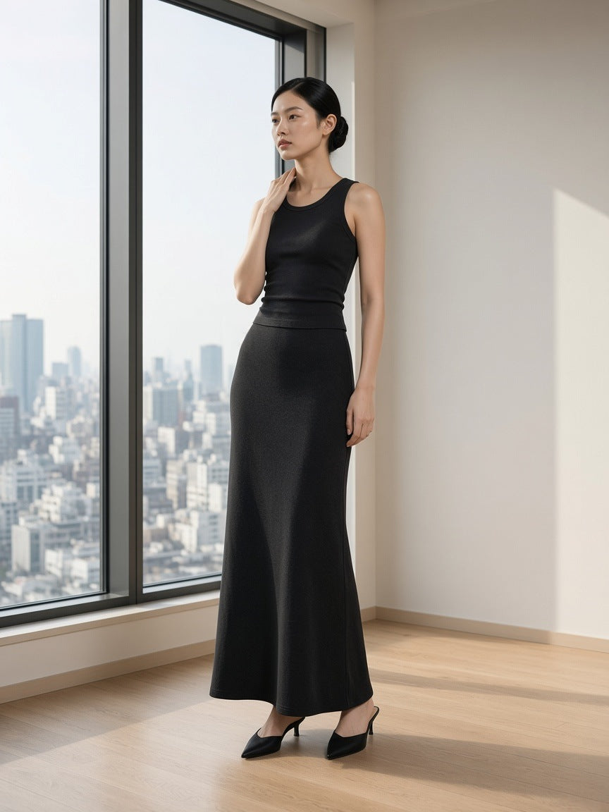 Woman in the Snow Washed Tank Top in Black in a hotel suite in Tokyo by day