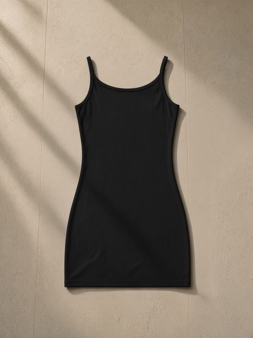 Women's Solid Tight Sleeveless Dress in Black, laid flat on pale limestone, back view