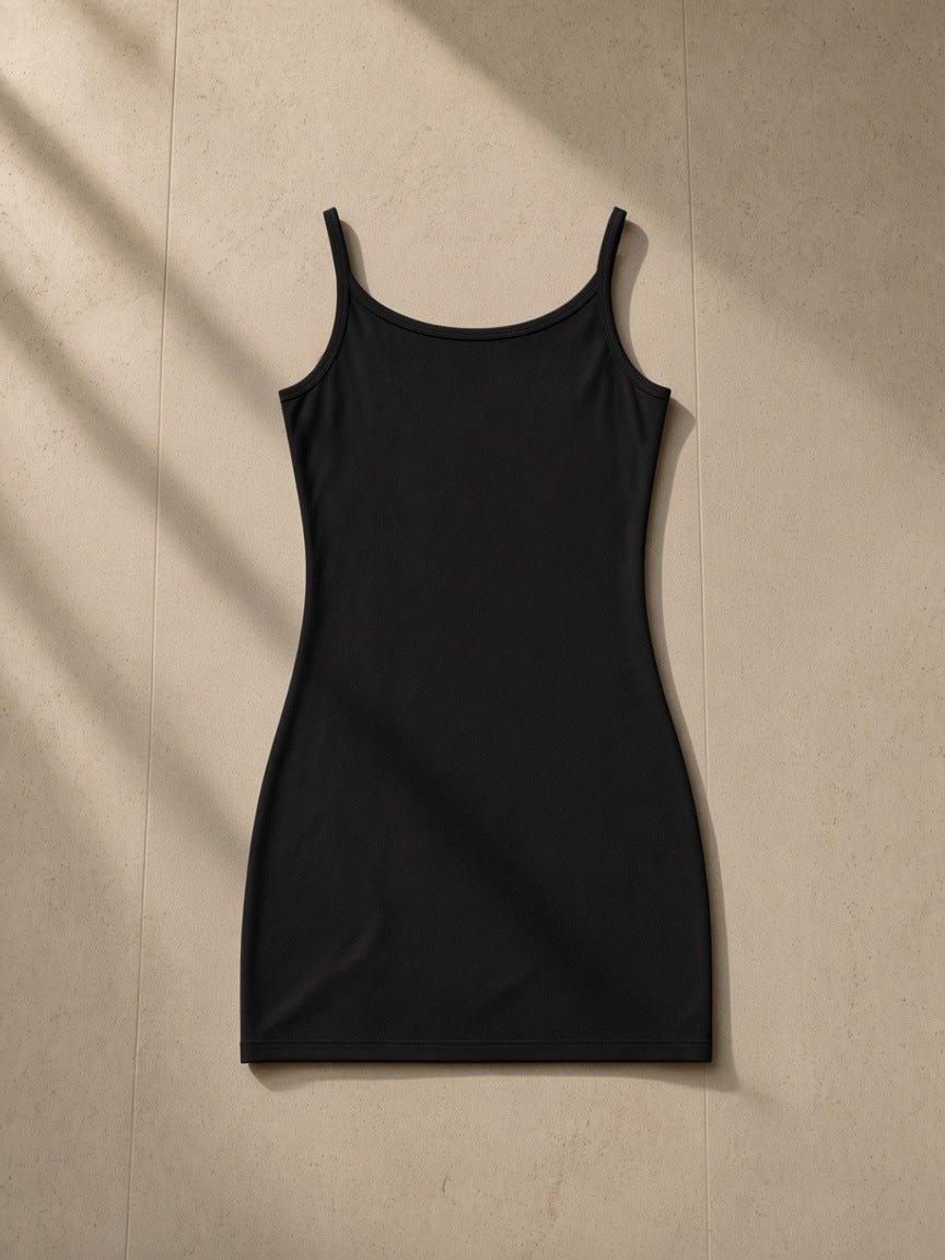 Women's Solid Tight Sleeveless Dress in Black, laid flat on pale limestone