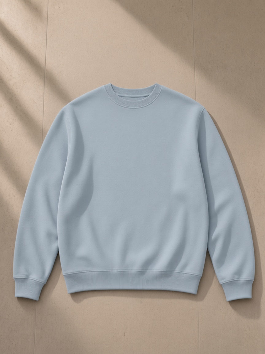 Streetwear Cotton Pullover in Ice Water, laid flat on pale limestone, front view
