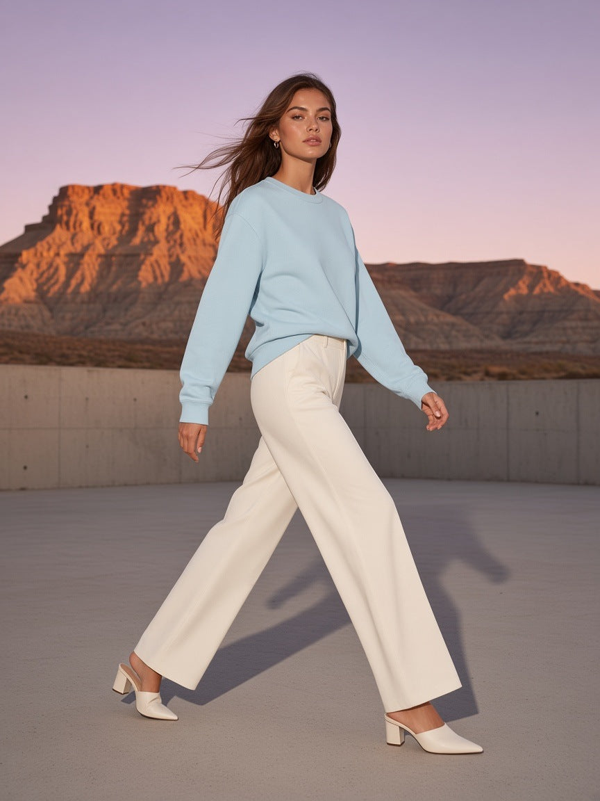 Woman in the Streetwear Cotton Pullover in Ice Water, in desert concrete at Amangiri, Utah at blue hour