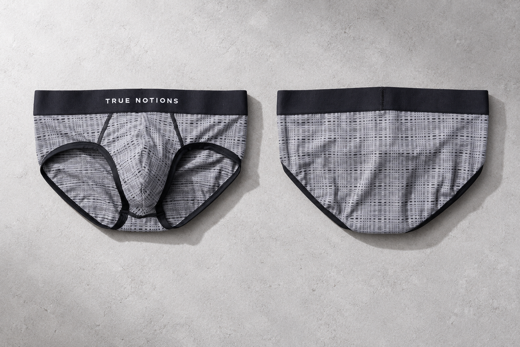 True Notions Tartan Brief — Grey, worn by the model, flat lay