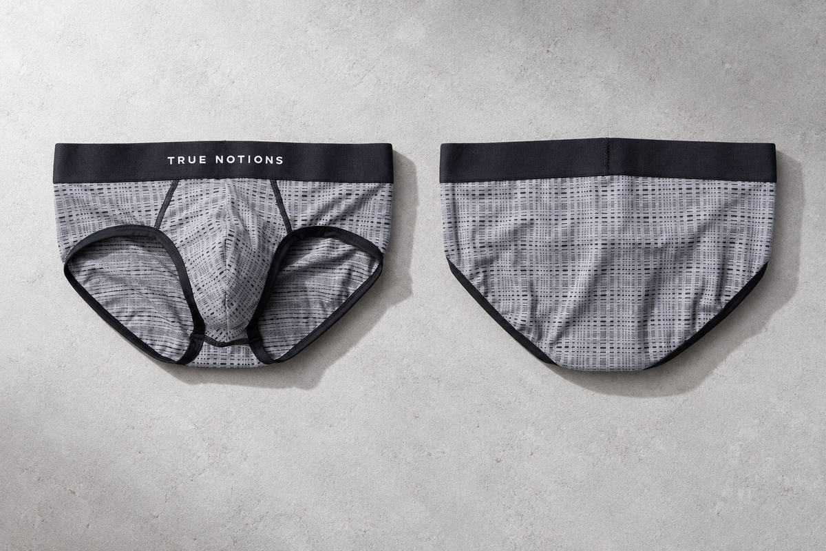 True Notions Tartan Brief — Grey, worn by the model, flat lay