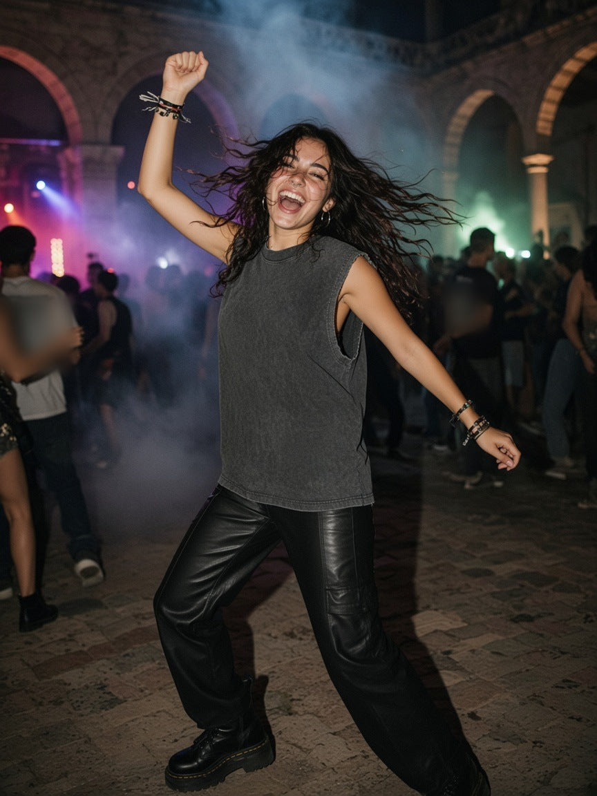 Woman in the Women's Snow Washed Frayed Hem Tank Top in Dark Gray, dancing at an Istanbul courtyard rave at 2am